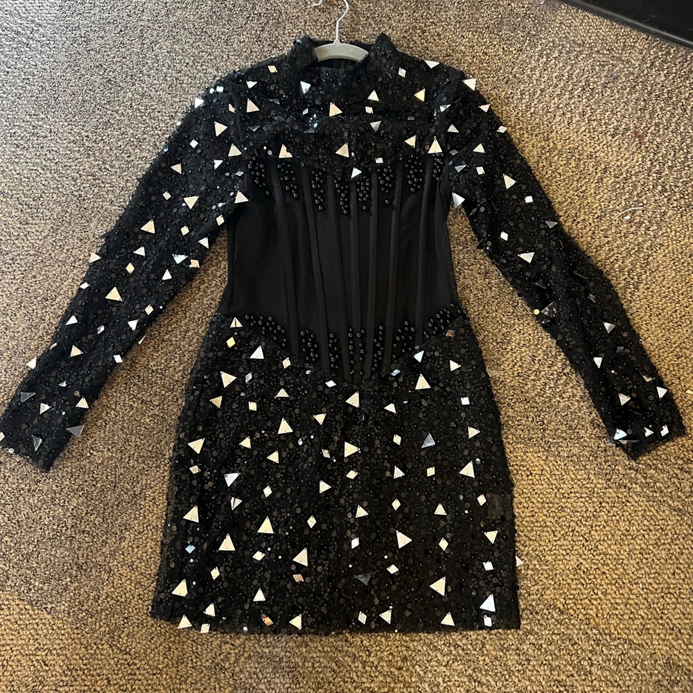 I got the dress from shopdenoa in a size medium. The dress color is all black